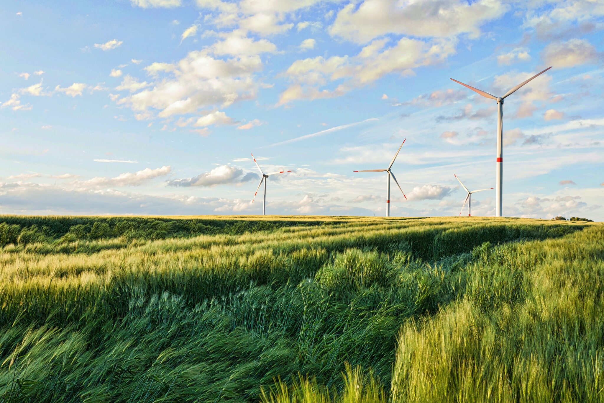 A beautiful shot of wind turbines under the cloudy sky in the Eiffel region, Germany